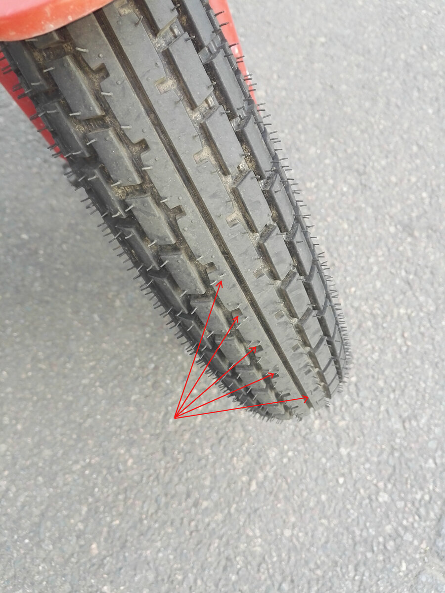 large.tyre_with_arrows.jpg